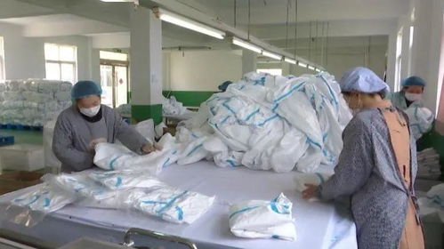 灵璧县锦尚制衣 开足马力生产防护服助力抗疫
